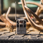 Tactacam Reveal X 3.0 Gen 3 cellular trail camera mounted outdoors with shed antlers