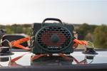 Turtlebox speaker strapped to a vehicle with tie down straps